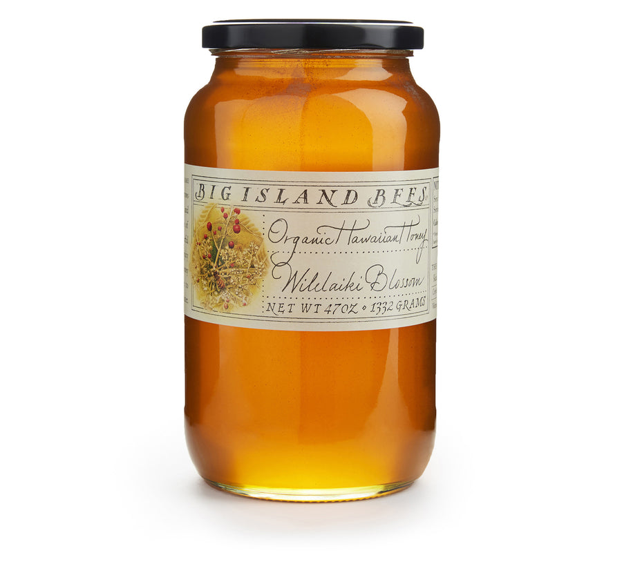 large jar of raw honey, organic Hawaiian Christmas berry honey
